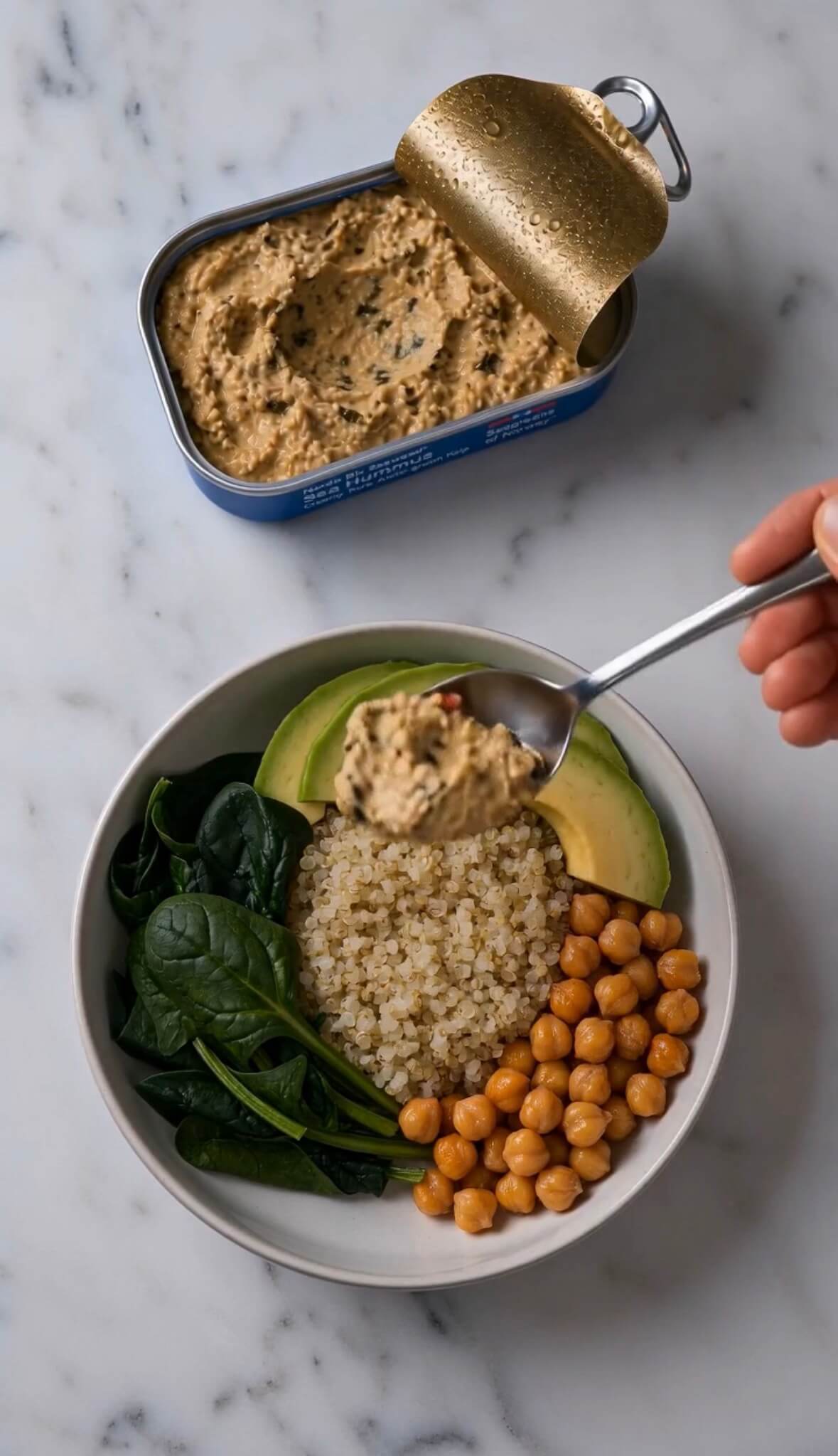Sea Hummus served in a grain bowl with quinoa, chickpeas and avocado